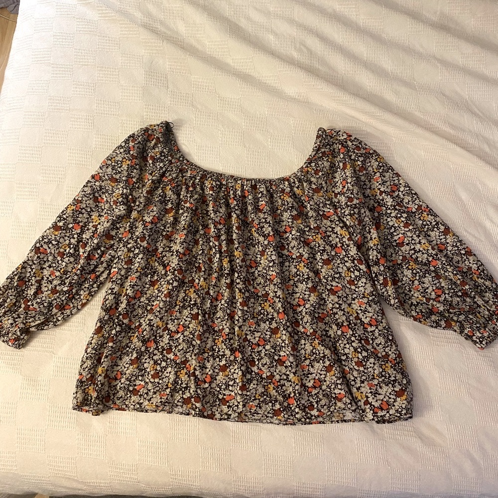 Large floral off the shoulder blouse.